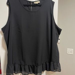 Black shell with ruffled bottom.